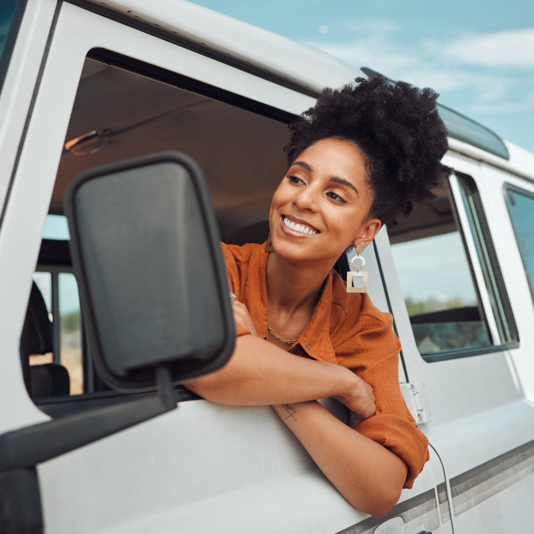 Road trip travel, black woman and window freedom to relax in camping car, summer countryside and vacation adventure in Africa. Happy young female stop on van driving journey in nature for inspiration.